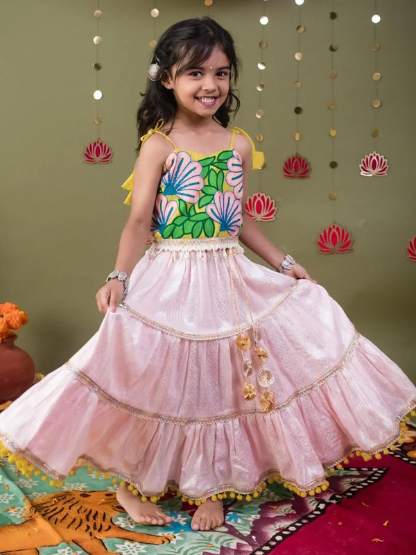 Light pink and yellow Navratri lehenga choli with floral aari embroidery and zari lace
