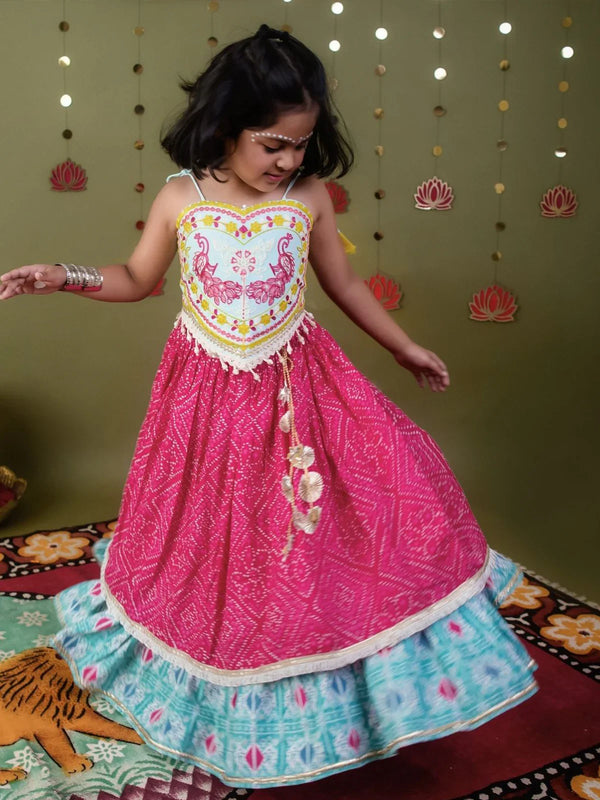 Pink bandhani print kids Navratri lehenga choli with peacock embroidered blouse and tassels