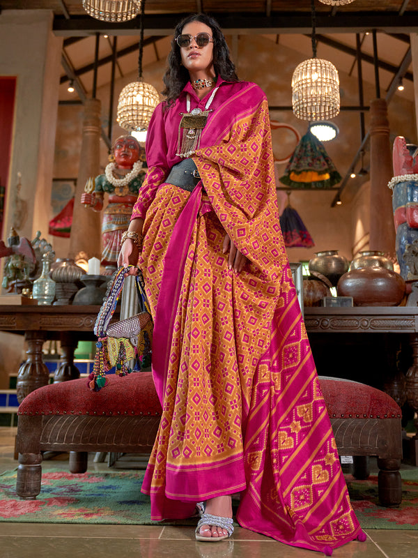 Woman in a vibrant saree with a traditional setting