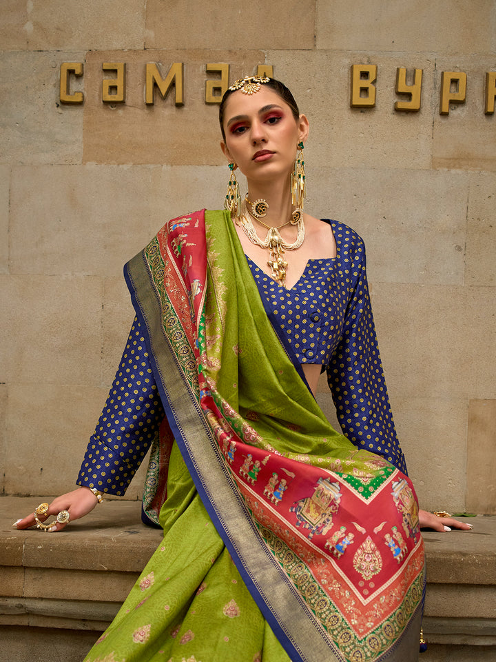Woman in traditional saree with jewelry against a stone wall background