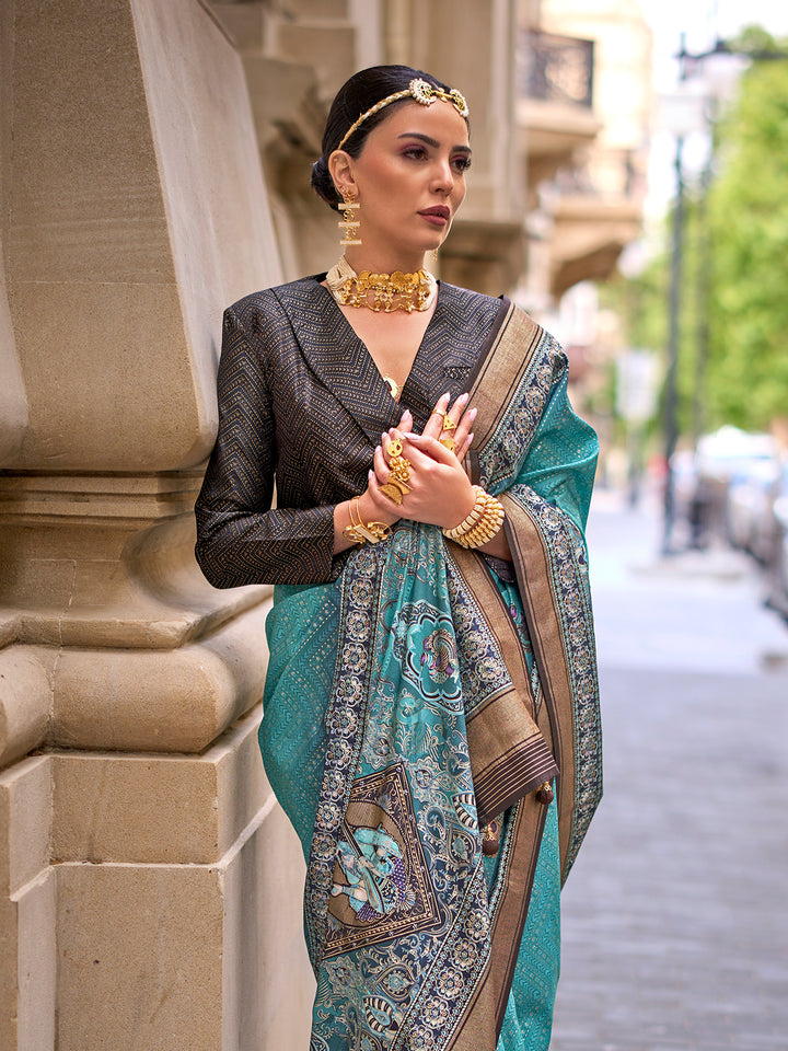 Woman in traditional attire with jewelry standing on a street.
