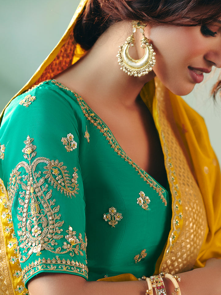Yellow Dola Viscose Silk Saree with Green Designer Blouse: Festive & Wedding Wear