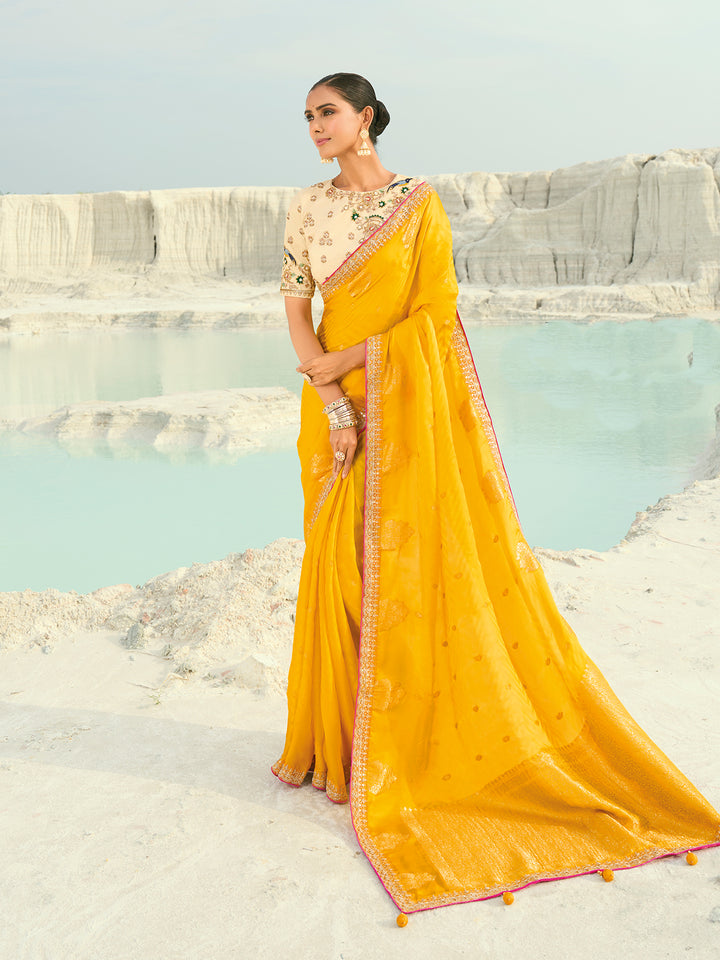 Yellow Dola Viscose Saree with Heavy Work and Cream Silk Blouse - Wedding & Festive Wear