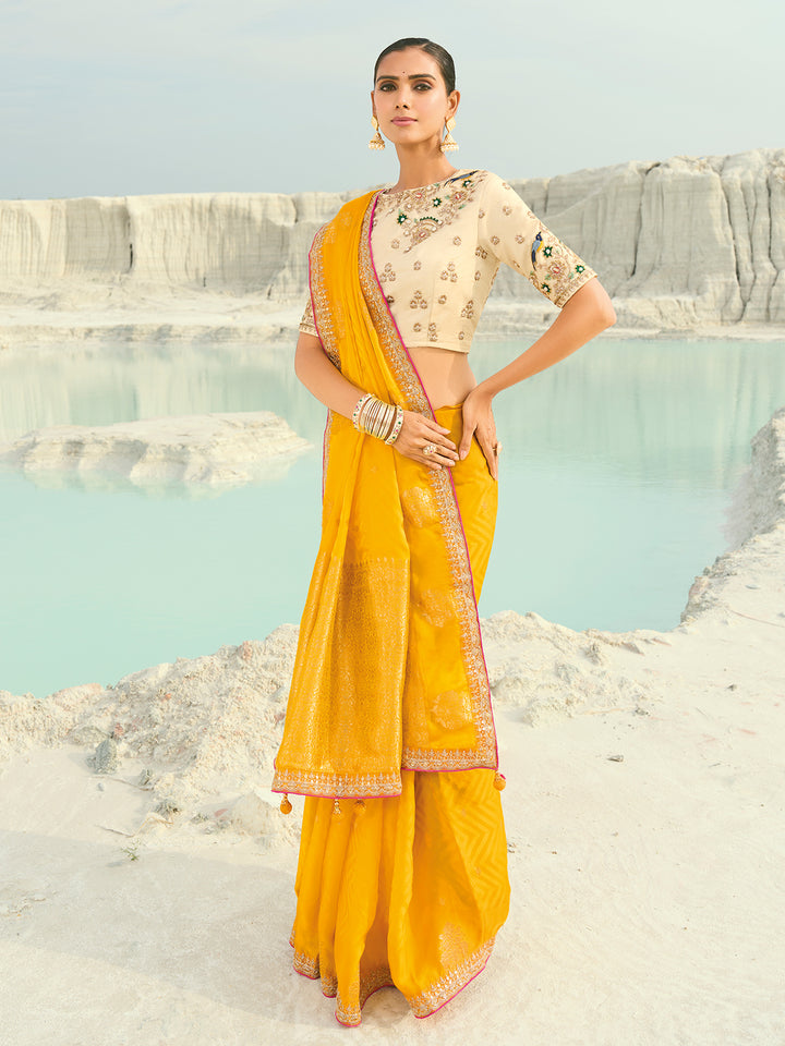 Yellow Dola Viscose Saree with Heavy Work and Cream Silk Blouse - Wedding & Festive Wear