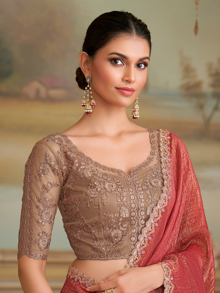 Woman wearing a traditional embroidered blouse and saree with a scenic background
