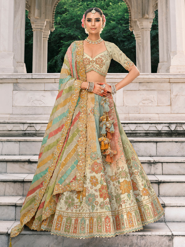 Woman in traditional multicolored outfit standing on stone steps with greenery in the background