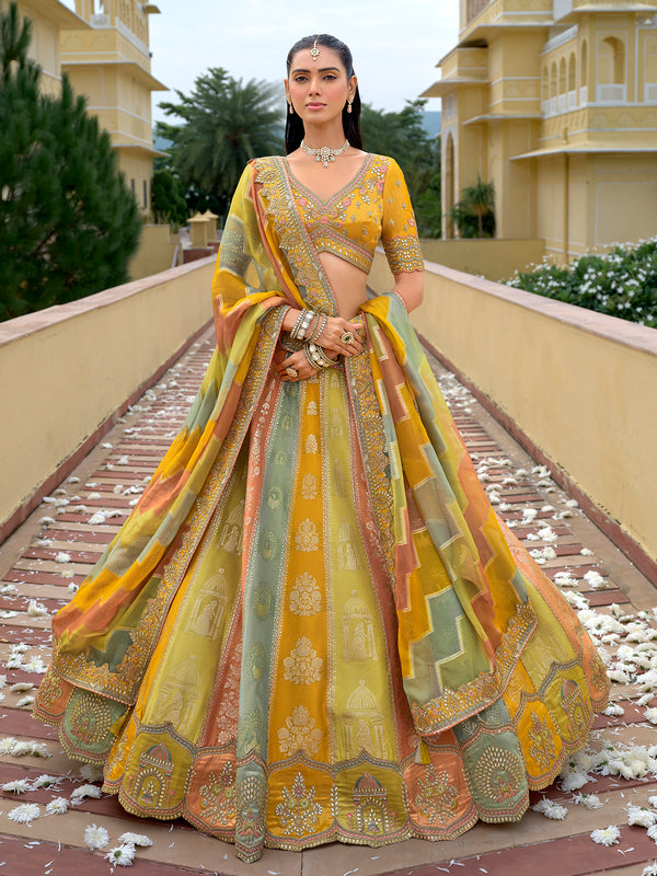 Woman in a colorful traditional outfit standing on a pathway with a building in the background