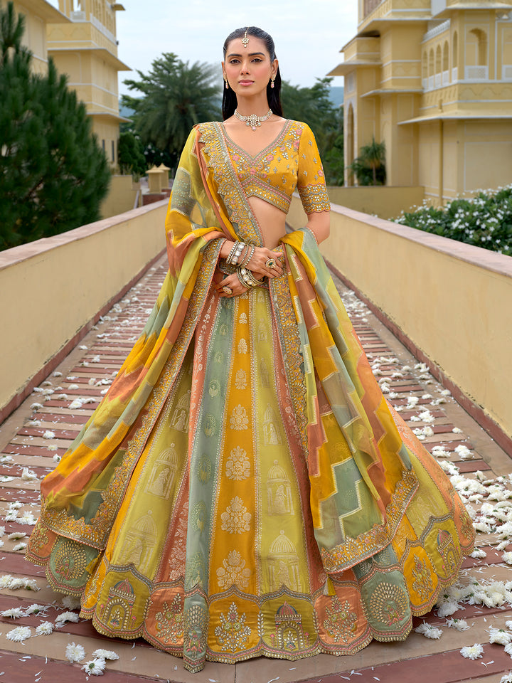 Woman in a colorful traditional outfit standing on a pathway with a building in the background