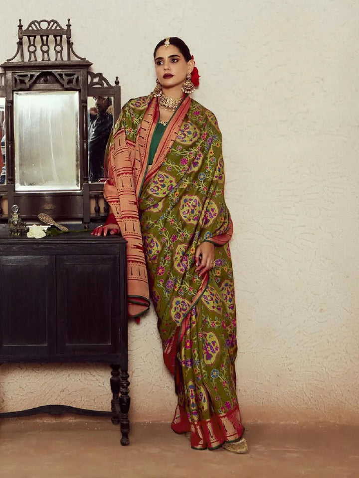 Green Brasso Saree with Embossed Patterns & Embroidered Dhupian Silk Blouse - VJV Now