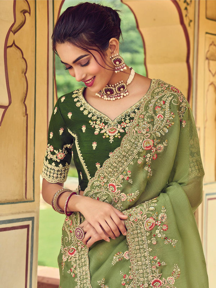 Green heavy embroidered Silk saree - VJV Now
