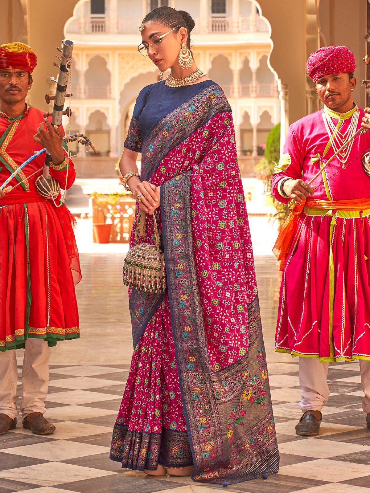Salmon pink paithani saree with patola style design on its body, contrast  paithani border & pallu of floral designs