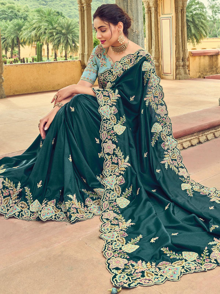 Teal green heavy embroidered Silk saree - VJV Now